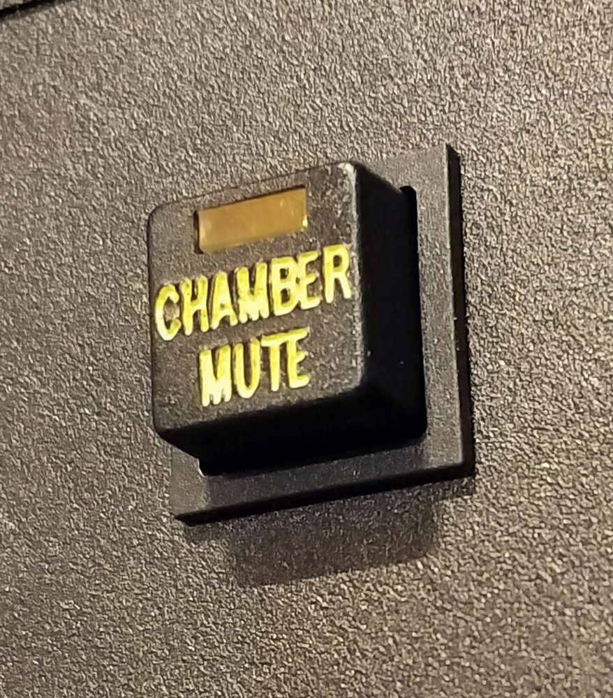 This Feb. 16, 2017, photo provided by Mike Freiberg shows a mute button inside the House of Representatives at the state Capitol in St. Paul, Minn. When Minnesota Democrats take control of their state House in January 2019, one early order of business will be disconnecting a button that allowed majority Republicans to mute their microphones. The parties have skirmished over the capability since the GOP installed it in 2015, with Democrats saying it was being used to silence them and Republicans maintaining it was necessary to keep order. (Mike Freiberg via AP)