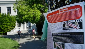 In this April 21, 2017, file photo, a leaflet is seen stapled to a message board near Sproul Hall on the University of California at Berkeley in Berkeley, Calif. (AP Photo/Ben Margot, File)