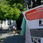 In this April 21, 2017, file photo, a leaflet is seen stapled to a message board near Sproul Hall on the University of California at Berkeley in Berkeley, Calif. (AP Photo/Ben Margot, File)