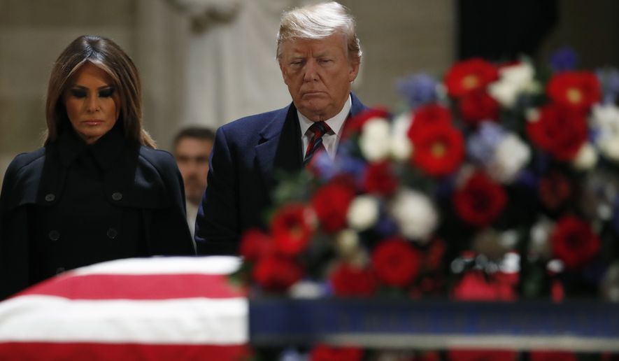President Donald Trump and first lady Melania Trump pay their respects to former President George H. W. Bush, as he lies in state in the Rotunda of the U.S. Capitol, Monday, Dec. 3, 2018, in Washington. (AP Photo/Jacquelyn Martin)
President Donald Trump and first lady Melania Trump greet the family of former President George H. W. Bush, Monday, Dec. 3, 2018, at the Blair House in Washington. Among the family are Bush&#x27; sons, former President George W. Bush and former Florida Gov. and 2016 GOP former presidential candidate Jeb Bush.  (AP Photo/Jacquelyn Martin)