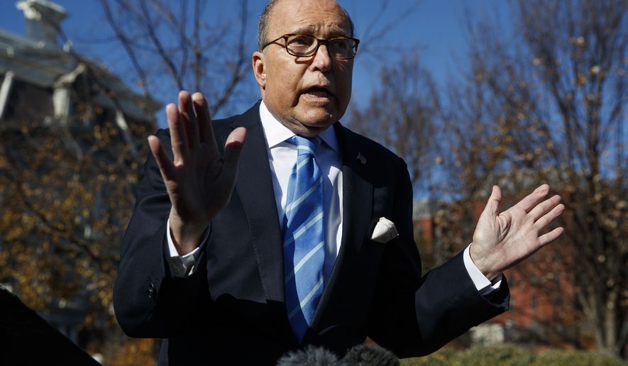 White House chief economic adviser Larry Kudlow talks with reporters about trade negotiations with China, at the White House, Monday, Dec. 3, 2018, in Washington. (AP Photo/Evan Vucci)