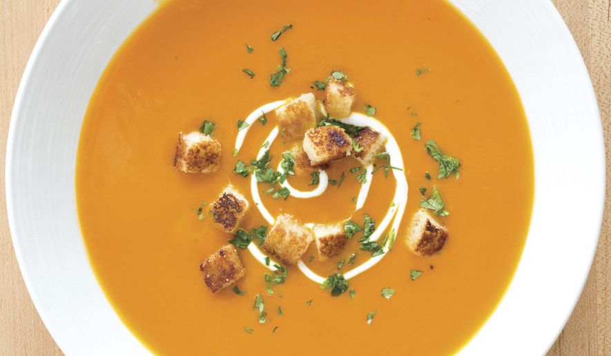 This undated photo provided by America's Test Kitchen in November 2018 shows carrot ginger soup in Brookline, Mass. (Carl Tremblay/America's Test Kitchen via AP)