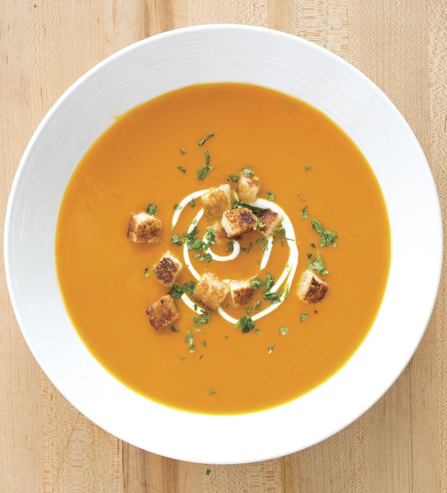 This undated photo provided by America's Test Kitchen in November 2018 shows carrot ginger soup in Brookline, Mass. (Carl Tremblay/America's Test Kitchen via AP)