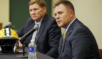 Green Bay Packers&#x27; general manager Brian Gutekunst, right, speaks as team president Mark Murphy looks on during a press conference at Lambeau field in Green Bay, Wisc., Monday, Dec. 3, 2018. The Packers fired head coach Mike McCarthy after a loss to the Arizona Cardinals on Sunday. (AP Photo/Mike Roemer)