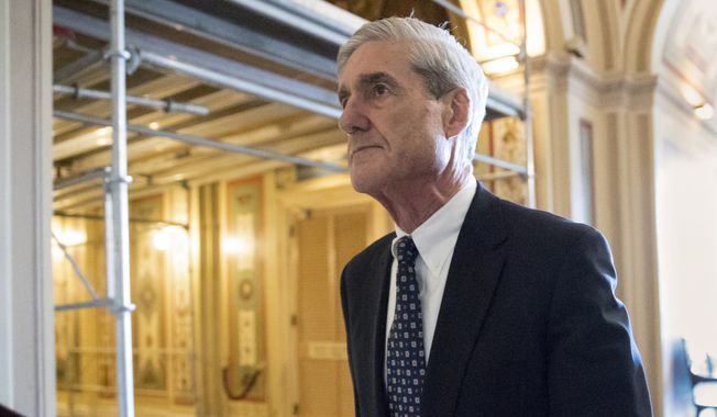 FILE - In this June 21, 2017, file photo, special counsel Robert Mueller departs after a meeting on Capitol Hill in Washington. Mueller is back. After a quiet few months in the run-up to the midterm elections, the special counsel’s Russia investigation is heating up again with a string of tantalizing new details emerging this week.(AP Photo/J. Scott Applewhite, File)