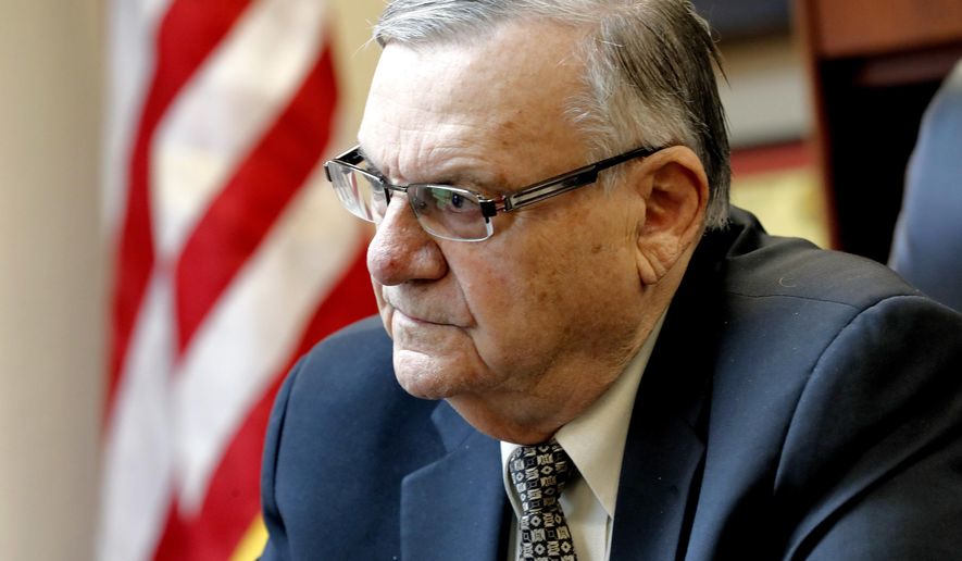 In this Jan. 10, 2018, file photo, former Sheriff Joe Arpaio at his office in Fountain Hills, Ariz. Arpaio&#39;s successor, Sheriff Paul Penzone, is making progress in carrying out a court-ordered overhaul of his agency after it was found to have racially profiled Latinos during Arpaio&#39;s traffic patrols that targeted immigrants. Still, the agency is not close to being released from the supervision of a federal judge and does not appear to have completely stomped out its problem with biased policing. (AP Photo/Matt York, File)