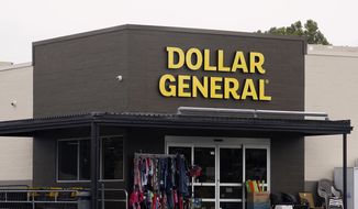 In this Aug. 3, 2017, file photo the Dollar General store is pictured in Luther, Okla. Dollar General reports earnings Tuesday, Dec. 4, 2018. (AP Photo/Sue Ogrocki, File)