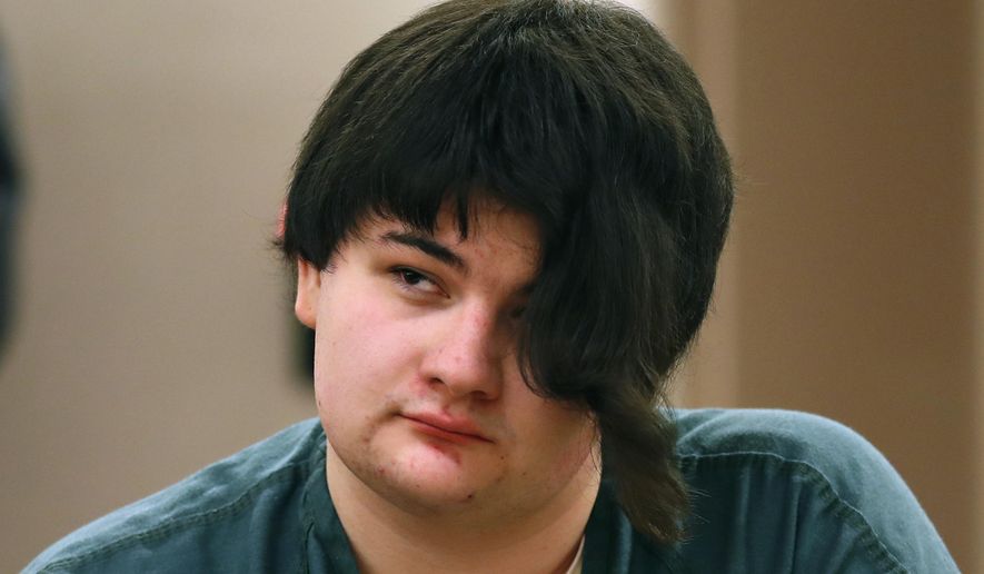 Andrea Balcer listens to testimony during the sentencing hearing for killing her parents, Tuesday, Dec. 4, 2018, at the Capital Judicial Center in Augusta, Maine. Balcer was 17 at the time of the Oct. 31, 2016, stabbings at their Winthrop home. The teenager told a police dispatcher that she "snapped" on the night of the stabbings. (AP Photo/Robert F. Bukaty)