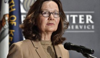FILE - In this Sept. 24, 2018, file photo, CIA Director Gina Haspel addresses the audience in Louisville, Ky. Haspel is headed to Capitol Hill to brief Senate leaders Tuesday, Dec. 4, 2018, on the slaying of Saudi journalist Jamal Khashoggi as senators weigh their next steps in possibly punishing the longtime Middle East ally over the killing. (AP Photo/Timothy D. Easley, File)