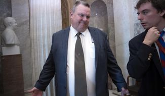 FILE - In this Nov. 14, 2018 file photo Sen. Jon Tester, D-Mont., talks to reporters at the Capitol in Washington. Tester&#39;s staff is walking back comments by the Montana Democrat that appear to confirm Gov. Steve Bullock plans to run for U.S. Senate. Tester was asked about the Democratic governor&#39;s plans for a Senate run during an appearance at American University Tuesday, DEC. 4, 2018. (AP Photo/J. Scott Applewhite,File)