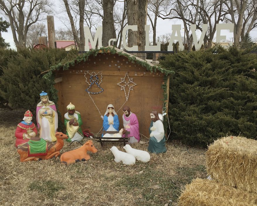 In this Dec. 27, 2015, file photo, a Nativity scene is displayed next to a public park in the farming community of McClave, Colo. (AP Photo/Russell Contreras) ** FILE **
