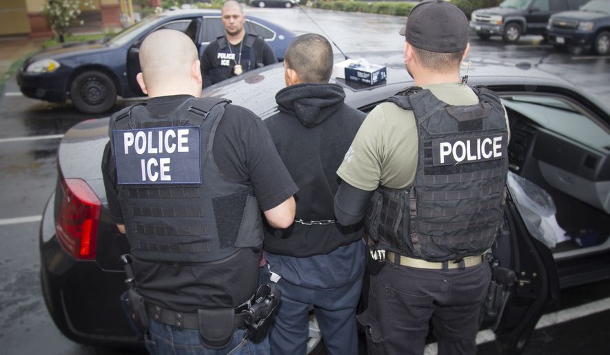 In this Tuesday, Feb. 7, 2017, photo released by U.S. Immigration and Customs Enforcement shows foreign nationals being arrested this week during a targeted enforcement operation conducted by U.S. Immigration and Customs Enforcement (ICE) aimed at immigration fugitives, re-entrants and at-large criminal aliens in Los Angeles. (Charles Reed/U.S. Immigration and Customs Enforcement via AP) ** FILE **