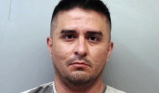 FILE - This file photo provided by the Webb County Sheriff&#x27;s Office shows U.S. Border Patrol agent Juan David Ortiz. Ortiz, who confessed to shooting four women in the head and leaving their bodies on rural Texas roadsides, was indicted Wednesday, Dec. 5, 2018, on a capital murder charge.  (Webb County Sheriff&#x27;s Office via AP, File)