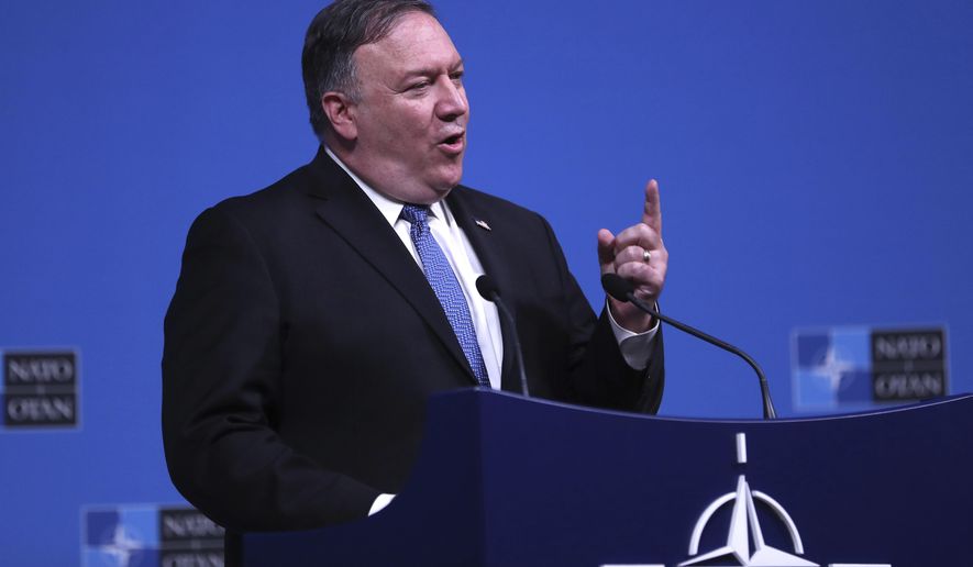 U.S. Secretary of State Mike Pompeo speaks during a media conference after a meeting of NATO foreign ministers at NATO headquarters in Brussels, Tuesday, Dec. 4, 2018. (AP Photo/Francisco Seco)