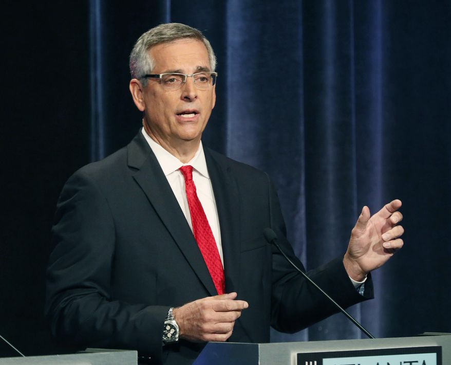 FILE - In this Oct. 2, 2018 file photo, Republican Brad Raffensperger participates in a debate in Atlanta. Raffensperger will take over as Georgia's secretary of state in January after winning a runoff Tuesday, Dec. 4. The race gained attention after GOP Gov.-elect Brian Kemp, who stepped down as secretary of state after the November election, was accused by Democrats of suppressing votes. (Bob Andres/Atlanta Journal-Constitution via AP, File)