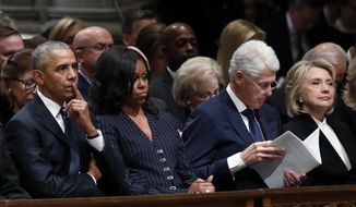 Former President Barack Obama, Michelle Obama, former President Bill Clinton and former Secretary of State Hillary Clinton listen during the State Funeral for former President George H.W. Bush at the National Cathedral, Wednesday, Dec. 5, 2018, in Washington. (AP Photo/Alex Brandon, Pool) ** FILE **