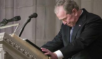 Former President George W. Bush becomes emotional as he speaks at the State Funeral for his father, former President George H.W. Bush, at the National Cathedral, Wednesday, Dec. 5, 2018, in Washington. (AP Photo/Alex Brandon, Pool)