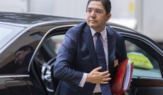 Moroccan Foreign Minister Nasser Bourita arrives for a round table on Western Sahara at the European headquarters of the United Nations in Geneva, Switzerland, Wednesday, Dec. 05, 2018. (Martial Trezzini/Keystone via AP)