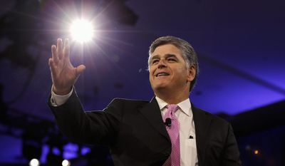 Sean Hannity of Fox News arrives on stage to speak with Republican National Committee Chairman Reince Priebus during the Conservative Political Action Conference (CPAC), Friday, March 4, 2016, in National Harbor, Md.  (Associated Press)