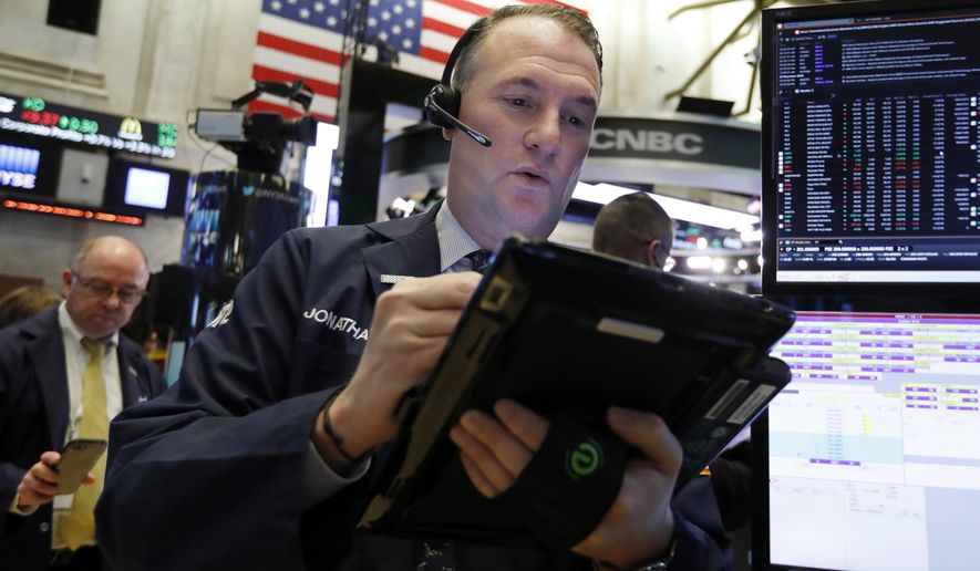 FILE- In this Nov. 28, 2018, file photo trader Jonathan Corpina works on the floor of the New York Stock Exchange. The U.S. stock market opens at 9:30 a.m. EST on Thursday, Dec. 6. (AP Photo/Richard Drew, File)