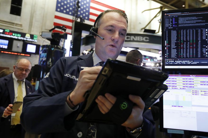 FILE- In this Nov. 28, 2018, file photo trader Jonathan Corpina works on the floor of the New York Stock Exchange. The U.S. stock market opens at 9:30 a.m. EST on Thursday, Dec. 6. (AP Photo/Richard Drew, File)