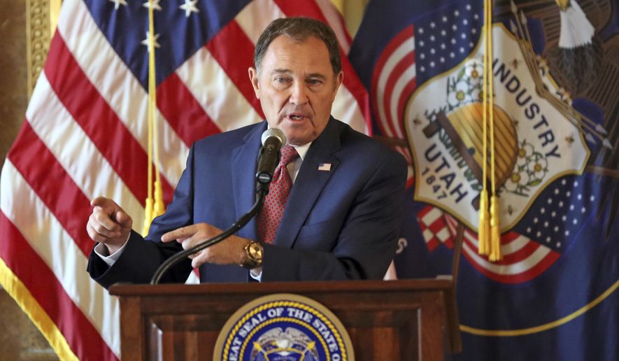 FILE - In this Sept. 12, 2018, file photo, Utah Gov. Gary Herbert speaks during a news conference at the Utah state Capitol in Salt Lake City. Herbert wants to add new sales taxes on services while cutting the overall rate to the tune of $200 million, part of a reform effort he says will be a "heavy lift" but is essential for the state's economic future. Herbert outlined the idea Thursday, Dec. 6, 2018, while introducing his plan for the state's $19 billion budget. (AP Photo/Rick Bowmer, File)