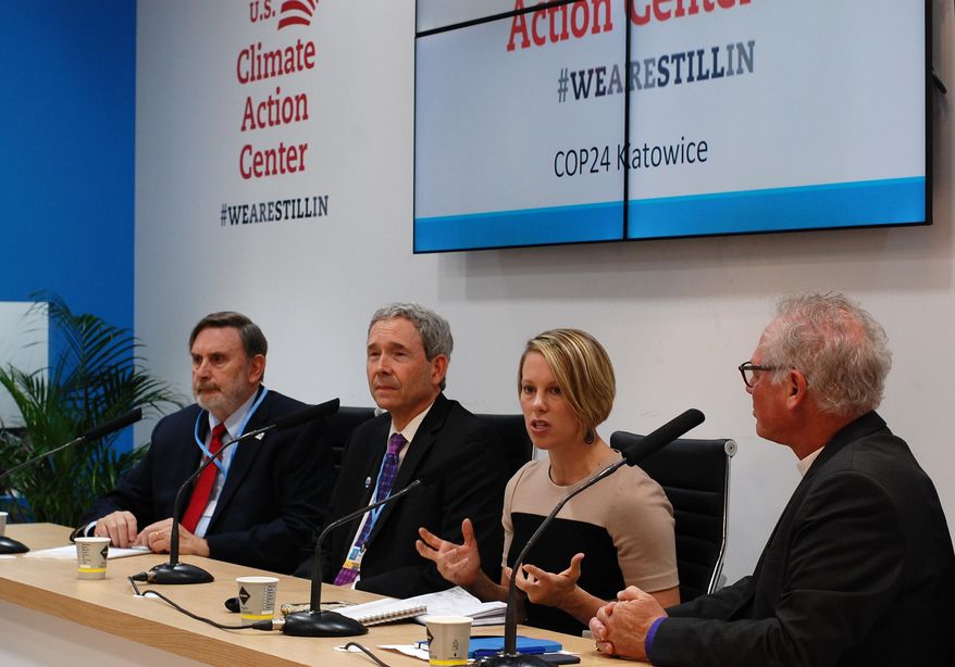 Ashley Allen, Climate and Land Senior Manager at Mars Incorporated, second from right, speaks at the launch of the U.S. Climate Action Center in Katowice, Poland, on Friday, Dec 7, 2018. Others on the podium are, from left, William Somplatsky-Jarman, Presbyterian Church, Patrick Hamilton, Minnesota Science Museum, and Bishop Marc Andrus, Episcopal Church. (AP Photo/Frank Jordans)