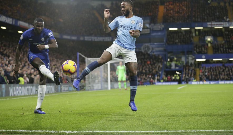 Chelsea's Antonio Rudiger, left, and Manchester City's Raheem Sterling compete for the ball during the English Premier League soccer match between Chelsea and Manchester City at Stamford Bridge in London, Saturday Dec. 8, 2018. (AP Photo/Tim Ireland)