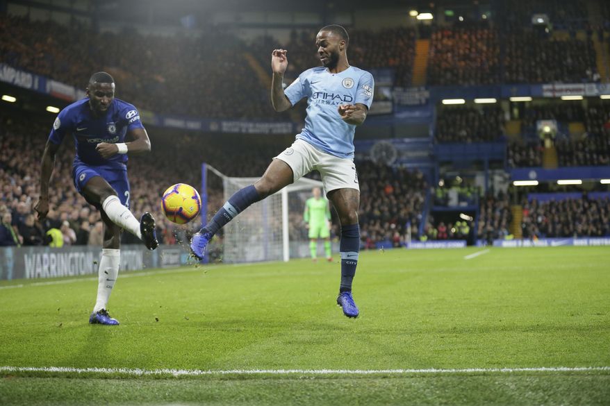 Chelsea's Antonio Rudiger, left, and Manchester City's Raheem Sterling compete for the ball during the English Premier League soccer match between Chelsea and Manchester City at Stamford Bridge in London, Saturday Dec. 8, 2018. (AP Photo/Tim Ireland)