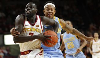 Iowa State guard Marial Shayok, left, is fouled by Southern University guard Richard Lee during the second half of an NCAA college basketball game, Sunday, Dec. 9, 2018, in Ames, Iowa. (AP Photo/Charlie Neibergall)
