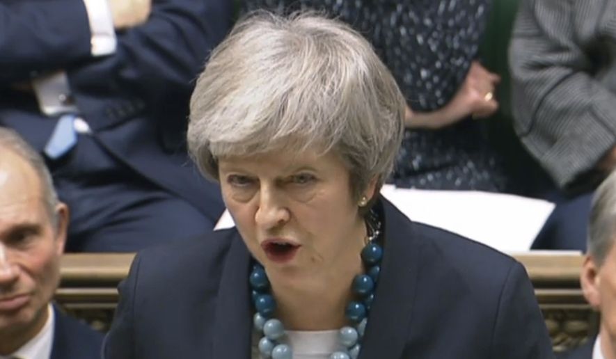 In this grab taken from video, Britain&#x27;s Prime Minister Theresa May makes a statement in the House of Commons, in London, Monday, Dec.  10, 2018.  May has postponed Parliament&#x27;s vote on her European Union divorce deal to avoid a shattering defeat — a decision that throws her Brexit plans into chaos. (PA via AP)