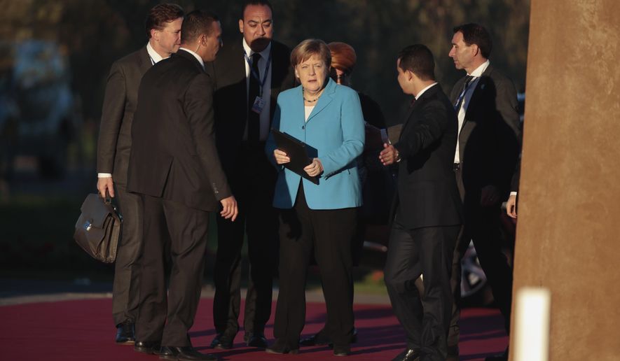 German Chancellor Angela Merkel arrives to attend a UN Migration Conference in Marrakech, Morocco, Monday, Dec.10, 2018. Top U.N. officials and government leaders from about 150 countries are uniting around an agreement on migration, while finding themselves on the defensive about the non-binding deal amid criticism and a walkout from the United States and some other countries. (AP Photo/Mosa'ab Elshamy)
