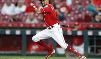 FILE - In this Sept. 9, 2018, file photo, Cincinnati Reds&#39; Billy Hamilton takes off for first base with a single off San Diego Padres relief pitcher Rowan Wick during the seventh inning of a baseball game, in Cincinnati.  A person familiar with the negotiations says the Kansas City Royals and outfielder Billy Hamilton have agreed to a $5.25 million contract for next season that includes up to $1 million in incentives. The person spoke to The Associated Press on condition of anonymity Monday, Dec. 10, 2018,  because the deal was pending a physical.  The career .236 hitter&#39;s biggest attribute is his speed — he stole at least 50 bases four straight seasons before dipping to 34 last season. (AP Photo/Gary Landers, File)