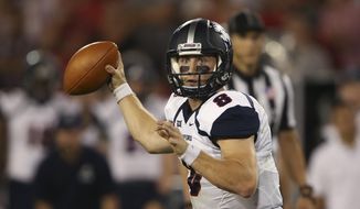 FILE - In this Sept. 16, 2017, file photo, Samford quarterback Devlin Hodges (8) throws a pass in the first half of an NCAA college football game against Georgia, in Athens, Ga. Hodges was selected to The Associated Press FCS All-America team, Tuesday, Dec. 11, 2018. (AP Photo/John Bazemore, File)