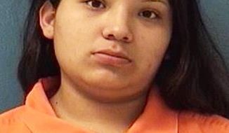 This Saturday, Dec. 8, 2018 booking photo providing by McKinley County Adult Detention Center shows Shayanne Nelson. Nelson&#39;s 8-month-old girl is fighting for her life after police say her 3-year-old brother accidentally shot her in the face Saturday in a Gallup, N.M., motel room while Nelson and her boyfriend Tyrell Bitsilly were in a shower. Nelson and Bitsilly face child abuse charges. (McKinley County Adult Detention Center via AP)