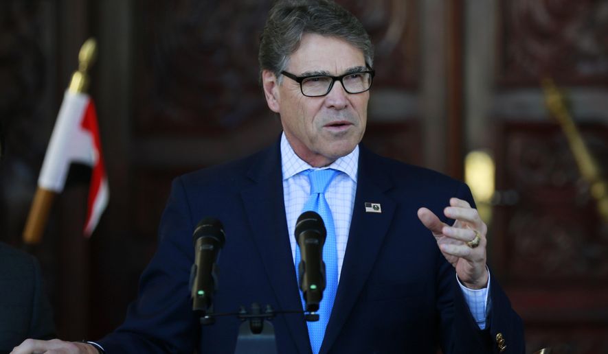 U.S. Energy Secretary Rick Perry speaks at a news conference after meeting with Barham Salih, Iraq&#39;s President in Baghdad, Iraq, Tuesday, Dec. 11, 2018. (Thaier Al-Sudani/Pool Photo via AP)