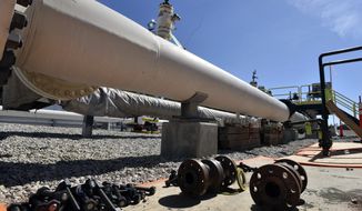 FILE - In this June 8, 2017, file photo, fresh nuts, bolts and fittings are ready to be added to the east leg of the pipeline near St. Ignace as Enbridge prepares to test the east and west sides of the Line 5 pipeline under the Straits of Mackinac in Mackinaw City, Mich. Legislation that would facilitate the replacement the Line 5 pipeline in the Great Lakes is headed to Michigan Gov. Rick Snyder&#39;s desk. The Republican-led Legislature approved the bill Tuesday, Dec. 11, 2018. (Dale G Young/Detroit News via AP, File)