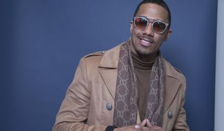 In this Dec. 10, 2018 photo, Nick Cannon poses for a portrait in New York to promote promoting his new show, &amp;quot;The Masked Singer.&amp;quot; (Photo by Amy Sussman/Invision/AP)