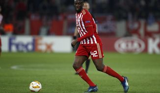 FILE - In this Thursday, Nov. 8, 2018 file photo, Olympiakos&#x27; Yaya Toure controls the ball during a Group F Europa League soccer match against Dudelange at Georgios Karaiskakis stadium in the port of Piraeus, near Athens. Former Barcelona and Manchester City midfielder Yaya Toure has left Olympiakos following a disappointing return to the Greek club.  The four-time African Footballer of the Year officially left Olympiakos Tuesday, Dec. 11, the club announcing that the two sides had “mutually agreed to end their cooperation.” (AP Photo/Thanassis Stavrakis, File)