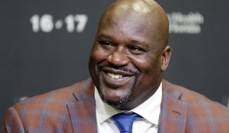 Retired Hall of Fame basketball player Shaquille O&#39;Neal smiles as he talks to reporters during an NBA basketball news conference in Miami, Dec. 22, 2016. (AP Photo/Alan Diaz) ** FILE **