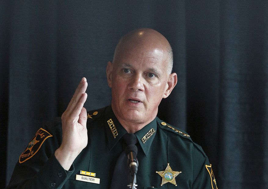 Pinellas County Sheriff Bob Gualtieri, the commission's chairman, pushed the measure, saying that most deaths in school shootings happen within the first few minutes, before officers responded. (Associated Press)