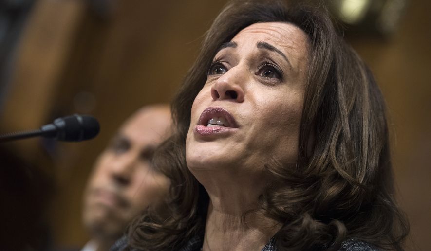 Sen. Kamala Harris, D-Calif., listens to Christine Blasey Ford testify during the Senate Judiciary Committee hearing on the nomination of Brett Kavanaugh to be an associate justice of the Supreme Court in Washington. (Tom Williams/Pool Photo via AP) **FILE**