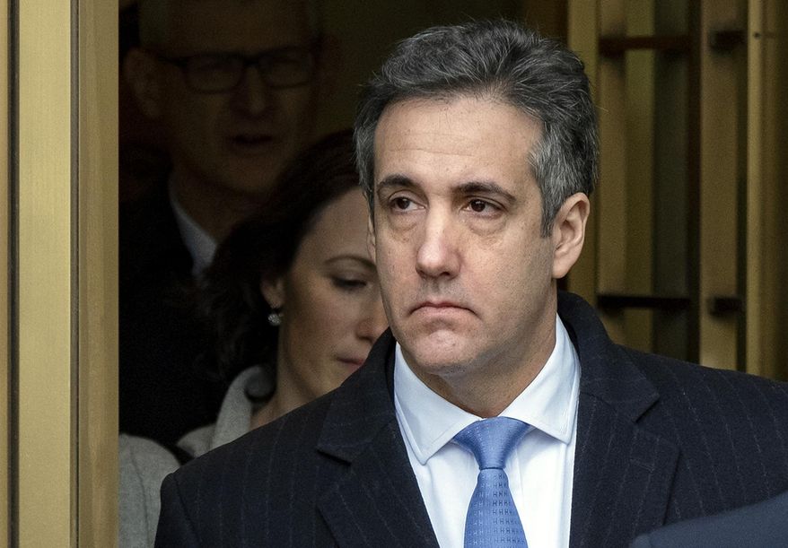 Michael Cohen, President Donald Trump's former lawyer, leaves federal court after his sentencing in New York, Wednesday, Dec. 12, 2018. Cohen was sentenced Wednesday to three years in prison for an array of crimes that included arranging the payment of hush money to two women that he says was done at the direction of Trump. (AP Photo/Craig Ruttle)