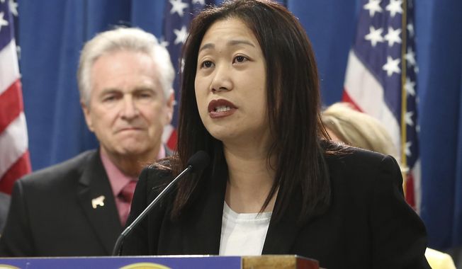 FILE - In this March 9, 2015 file photo state Sen. Janet Nguyen, R-Garden Grove, speaks at a news conference in Sacramento, Calif. Supporters of the first Vietnamese-American woman elected to the California Legislature have dropped their recount bid more than a week after her successor was sworn in. Orange County Registrar Neal Kelley said Wednesday, Dec. 12, 2018, that Nguyen's campaign ended the partial recount in the 34th Senate district after two days. (AP Photo/Rich Pedroncelli, file)
