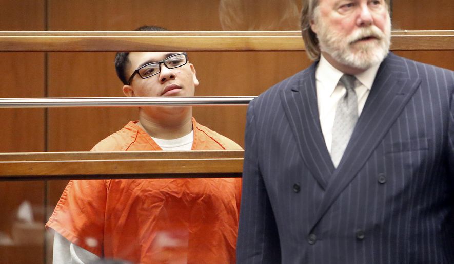 FILE - In this Jan. 12, 2015 file photo, Alberto Ochoa, left, appears in Los Angeles Superior Court with his attorney Christopher C. Chaney, as one of four defendants being charged in connection to the 2014 beating death of USC graduate student Xinran Ji, from China, during an attempted robbery. Ochoa, now 21, was found guilty of first-degree murder Wednesday, Dec. 12, 2018, making him the fourth person convicted in the 2014 attack. (Al Seib/Los Angeles Times via AP, Pool, File)