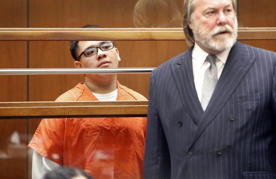 FILE - In this Jan. 12, 2015 file photo, Alberto Ochoa, left, appears in Los Angeles Superior Court with his attorney Christopher C. Chaney, as one of four defendants being charged in connection to the 2014 beating death of USC graduate student Xinran Ji, from China, during an attempted robbery. Ochoa, now 21, was found guilty of first-degree murder Wednesday, Dec. 12, 2018, making him the fourth person convicted in the 2014 attack. (Al Seib/Los Angeles Times via AP, Pool, File)