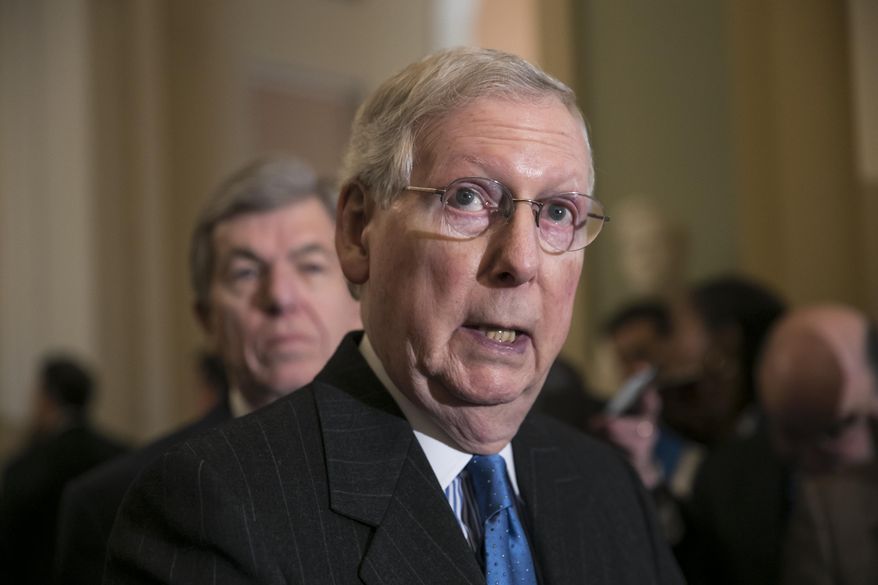 Senate Majority Leader Mitch McConnell, R-Ky., joined at left by Sen. Roy Blunt, R-Mo., speaks after a strategy session, at the Capitol in Washington, Tuesday, Dec. 11, 2018. Under pressure from President Donald Trump and many of his Republican colleagues, Senate Majority Leader Mitch McConnell said Tuesday that he will bring legislation to the floor to overhaul the nation's sentencing laws. (AP Photo/J. Scott Applewhite)
