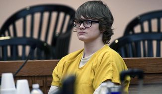 FILE - In this Feb. 16, 2018 file photo Jesse Osborne waits for a ruling at the Anderson County Courthouse. Osborne, a teen charged with shooting at a group of South Carolina elementary school students outside for recess, killing one of them, is set to appear in court. Prosecutors would not say why Osborne will appear Wednesday, Dec. 12, 2018 at the Anderson County courthouse. (Ken Ruinard/The Independent-Mail via AP, Pool)
