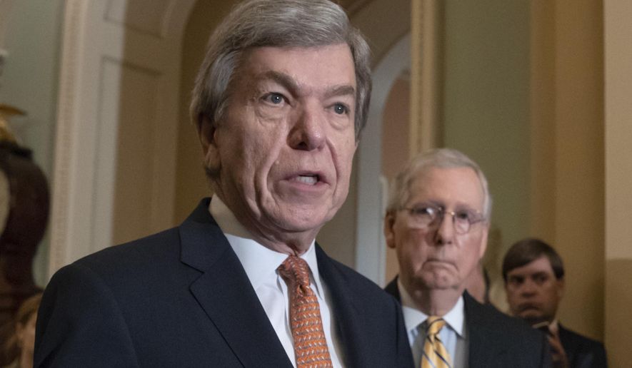 In this Aug. 21, 2018, file photo, Sen. Roy Blunt, R-Mo., speaks as Senate Majority Leader Mitch McConnell, R-Ky., listens at the Capitol in Washington. House and Senate negotiators have reached an agreement on a bill to overhaul the process for handling sexual misconduct allegations on Capitol Hill. The push for the legislation took on new urgency in the past year, as more than a half-dozen lawmakers resigned amid allegations of sexual misconduct. (AP Photo/J. Scott Applewhite, File)