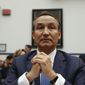 In this May 2, 2017, file photo, United Airlines CEO Oscar Munoz prepares to testify on Capitol Hill in Washington, before a House Transportation Committee oversight hearing. (AP Photo/Pablo Martinez Monsivais, File)